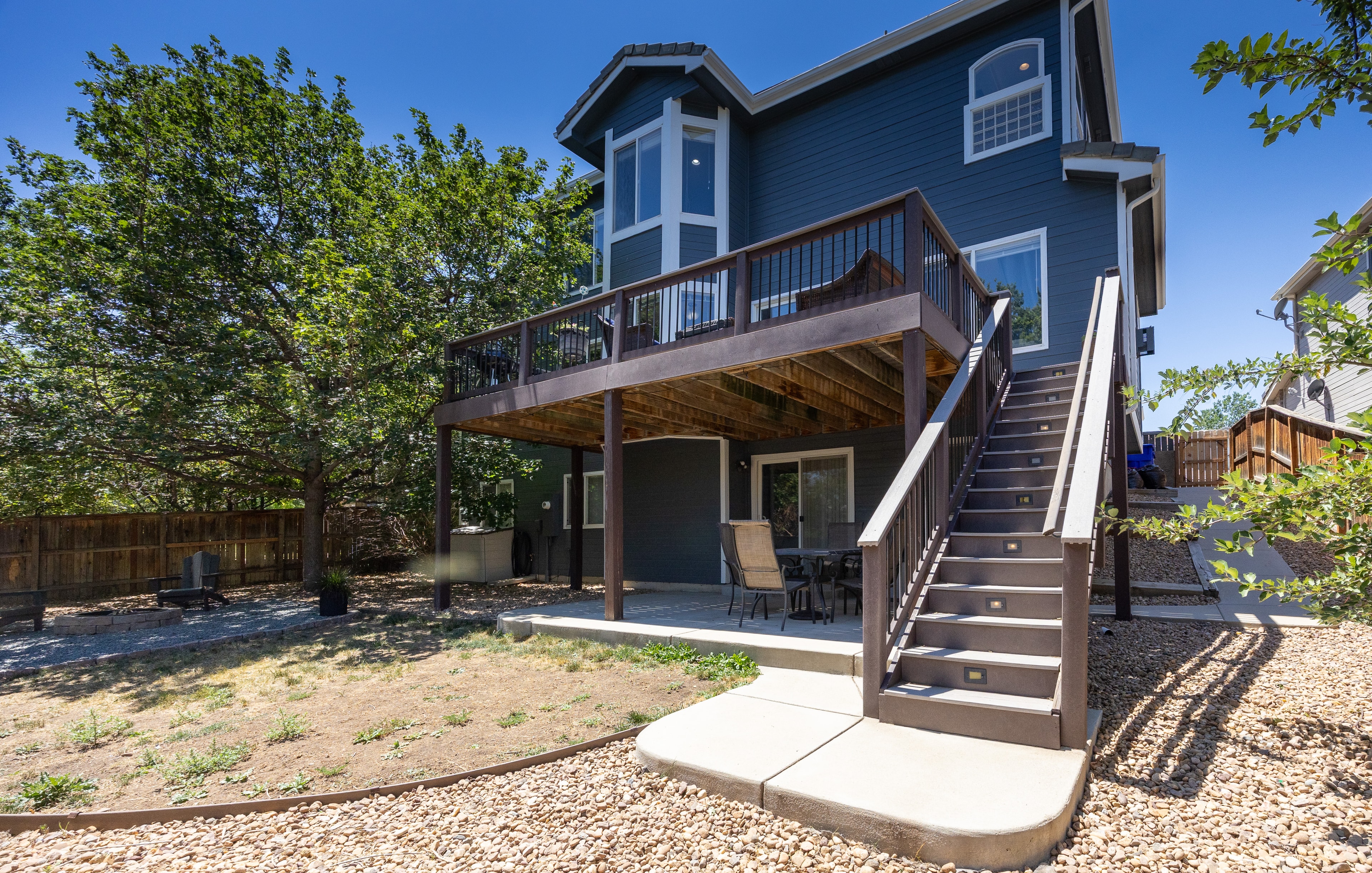 Backyard with deck and stairs