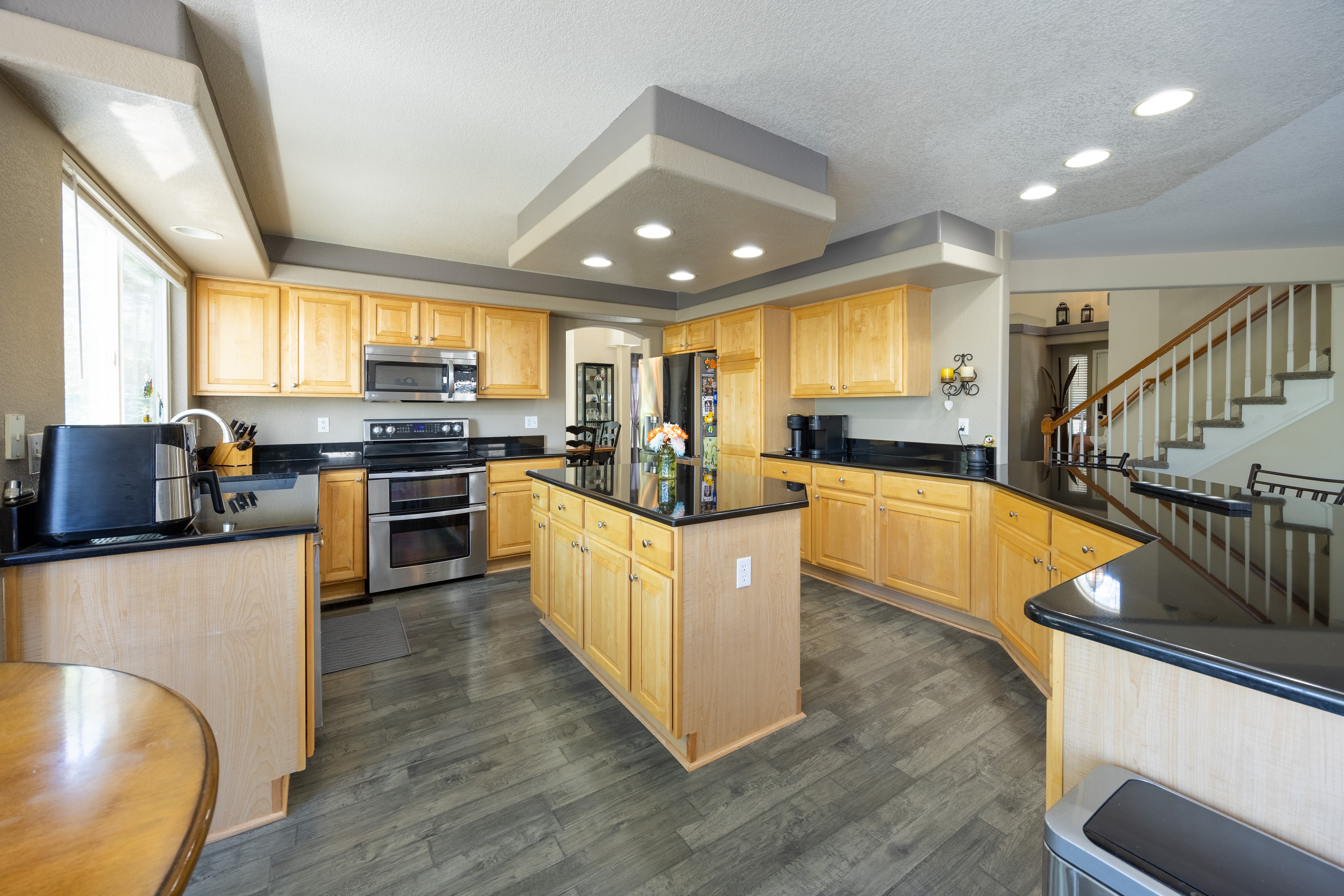 Kitchen with island and stainless appliances